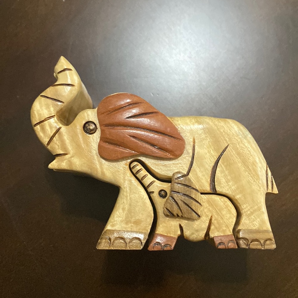 A elephant shaped secret jewelry holder.
